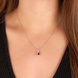 Emerald-Cut Ruby and Diamond Halo Pendant in 18K White Gold (6x5mm)